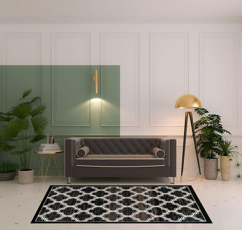 5' X 8' Black Brown And Ivory Geometric Area Rug