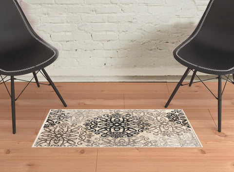 2' X 3' Beige Black And Brown Floral Medallion Area Rug
