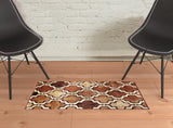 2' X 3' Brown And Ivory Quatrefoil Distressed Area Rug