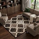 7' X 9' Brown Black And Ivory Quatrefoil Distressed Area Rug