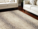 5' X 8' Beige Gazelle Print Shag Handmade Non Skid Area Rug