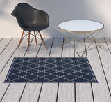 2' X 4' Blue and Ivory Geometric Stain Resistant Indoor Outdoor Area Rug