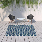 7' x 10' Blue and Ivory Floral Stain Resistant Indoor Outdoor Area Rug