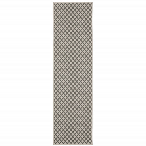 2' X 7' Beige Geometric Stain Resistant Indoor Outdoor Area Rug