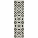 2' X 7' Beige and Black Geometric Stain Resistant Indoor Outdoor Area Rug