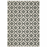 7' X 9' Beige and Black Geometric Stain Resistant Indoor Outdoor Area Rug