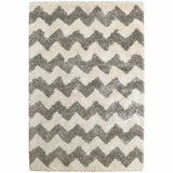 4' X 6' Grey And Ivory Geometric Shag Power Loom Stain Resistant Area Rug