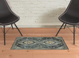 2' X 3' Light Blue Navy Gold Ivory And Grey Oriental Power Loom Stain Resistant Area Rug With Fringe