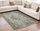 5' X 8' Beige And Blue Oriental Distressed Area Rug