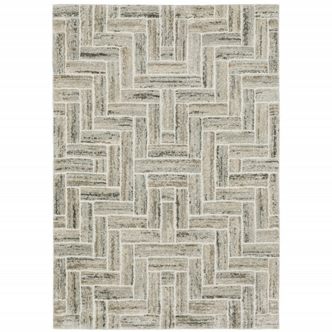 7' X 10' Ivory And Beige Geometric Area Rug