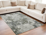 5' X 8' Beige And Gray Abstract Distressed Area Rug
