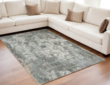 5' X 8' Gray And Ivory Oriental Distressed Area Rug