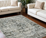 6' X 9' Ivory Grey Charcoal Blue And Taupe Oriental Power Loom Stain Resistant Area Rug