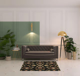 4' X 6' Black Red Green Ivory Salmon And Yellow Floral Power Loom Stain Resistant Area Rug