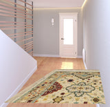 2' X 6' Beige Pale Blue Rust Gold Tan Brown And Orange Oriental Power Loom Stain Resistant Runner Rug With Fringe