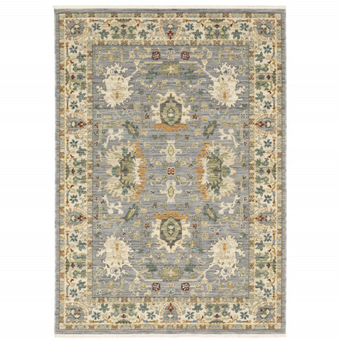 5' X 8' Blue And Ivory Oriental Power Loom Stain Resistant Area Rug With Fringe