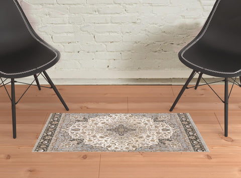 2' X 3' Ivory And Blue Oriental Power Loom Stain Resistant Area Rug With Fringe