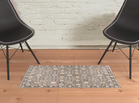 2' X 3' Grey And Ivory Oriental Power Loom Stain Resistant Area Rug With Fringe