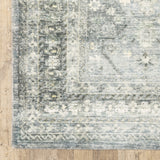 5' X 7' Blue Ivory And Grey Oriental Power Loom Stain Resistant Area Rug