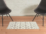 2' X 3' Ivory And Brown Geometric Shag Power Loom Stain Resistant Area Rug