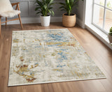 4' X 6' Beige Grey Gold Blue Rust And Teal Abstract Power Loom Stain Resistant Area Rug With Fringe