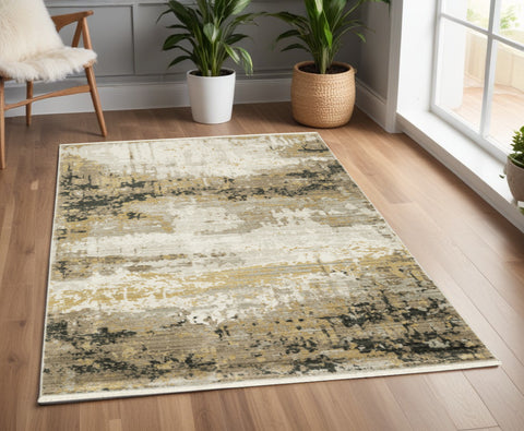 4' X 6' Gray and Black Abstract Power Loom Area Rug With Fringe