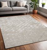 5' X 8' Tan Silver And Gray Quatrefoil Area Rug
