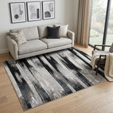 5' X 8' Black Silver and Gray Abstract Power Loom Area Rug