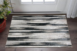 2' X 3' Black Silver and Gray Abstract Power Loom Area Rug
