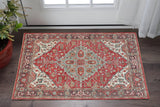 2' X 3' Red Gray And Ivory Wool Floral Hand Knotted Distressed Stain Resistant Area Rug With Fringe