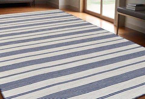 5' X 8' Blue And Ivory Striped Dhurrie Hand Woven Stain Resistant Area Rug
