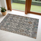 2' X 3' Black Ivory And Green Wool Geometric Hand Tufted Distressed Area Rug