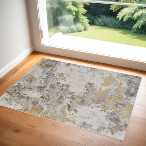 2' X 3' Ivory Gray And Gold Abstract Area Rug