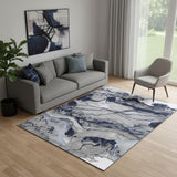 5' X 7' Blue Gray And Ivory Abstract Power Loom Stain Resistant Area Rug