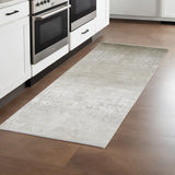 10' Tan and Ivory Abstract Power Loom Distressed Runner Rug With Fringe