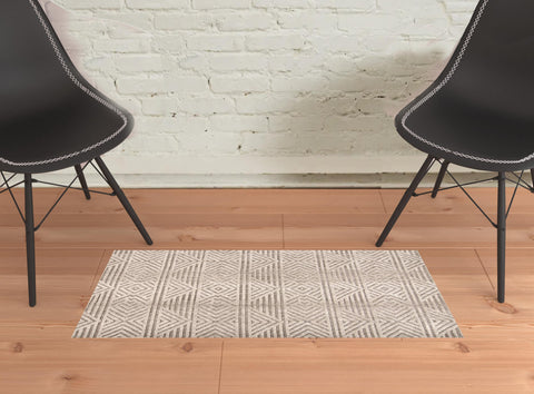 2' X 3' Tan Ivory And Brown Geometric Stain Resistant Area Rug