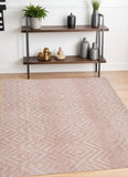 4' X 6' Pink And Ivory Geometric Stain Resistant Area Rug