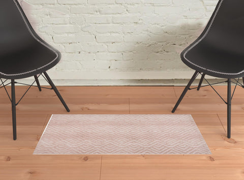 2' X 3' Pink And Ivory Geometric Stain Resistant Area Rug