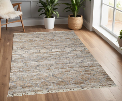 4' X 6' Tan and Gray Geometric Hand Woven Area Rug With Fringe