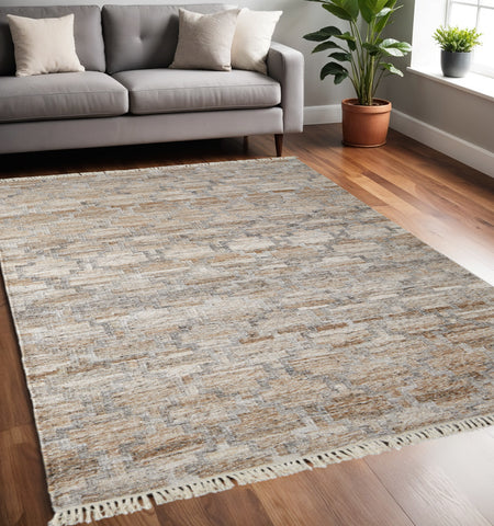 5' X 8' Tan and Gray Geometric Hand Woven Area Rug With Fringe