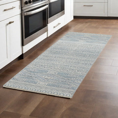 10' Ivory and Blue Geometric Hand Knotted Runner Rug With Fringe