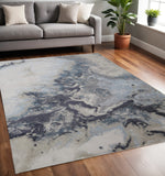5' X 8' Ivory Black And Gray Abstract Area Rug