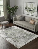 5' X 8' Green Gray And Ivory Abstract Distressed Stain Resistant Area Rug