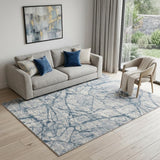 5' X 8' Blue Gray And Ivory Abstract Distressed Stain Resistant Area Rug