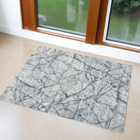 2' X 3' Blue Gray And Ivory Abstract Distressed Stain Resistant Area Rug