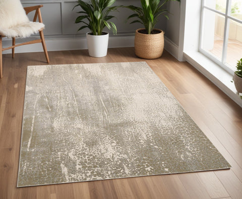 4' X 6' Gold Gray And Ivory Abstract Area Rug