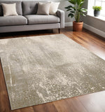 5' X 8' Gold Gray And Ivory Abstract Area Rug