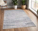 4' X 6' Ivory Gray And Blue Abstract Area Rug