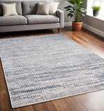 5' X 8' Ivory Gray And Blue Abstract Area Rug