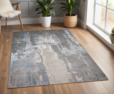 4' X 6' Gray Ivory And Blue Abstract Area Rug